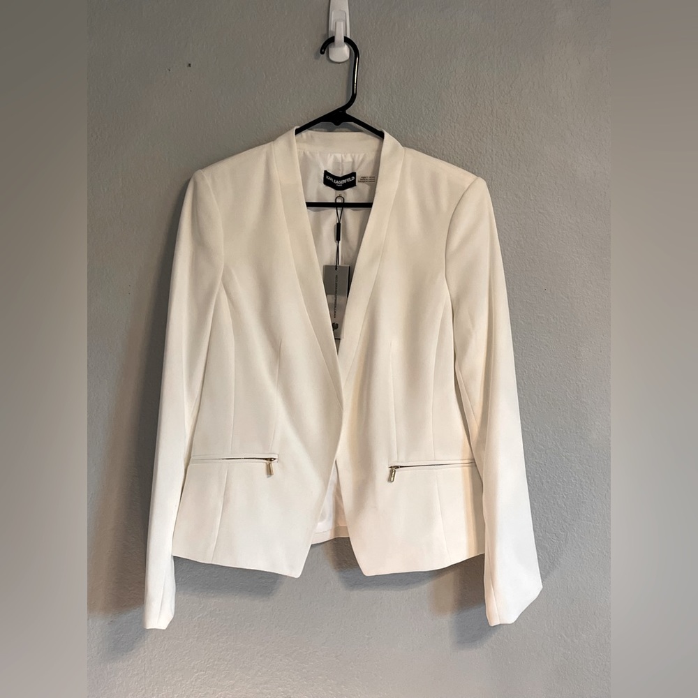 Karl Lagerfeld white open blazer with gold zipper detail on pockets.